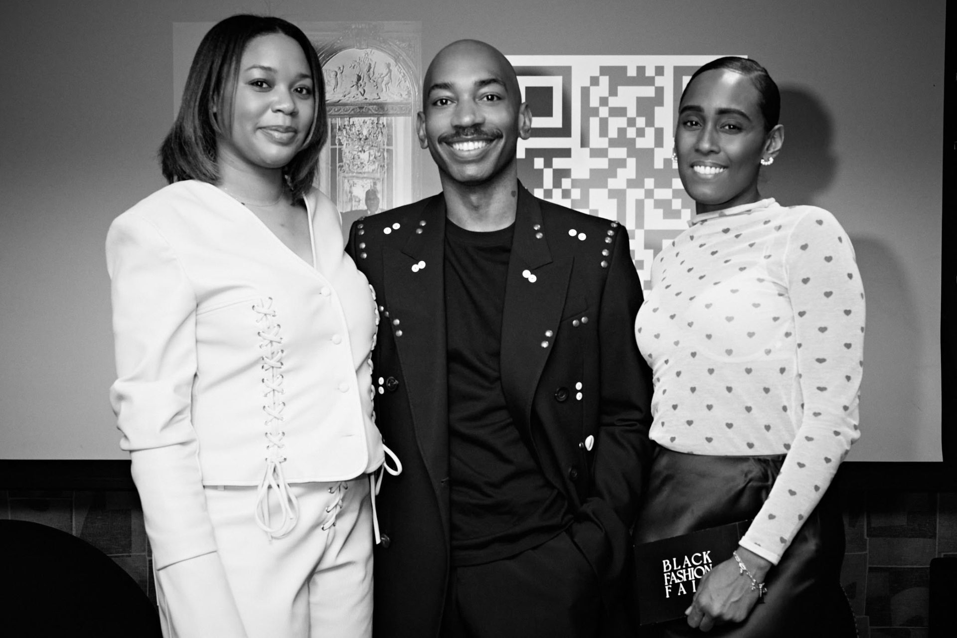 Black Fashion Fair speaking moment — trio portrait